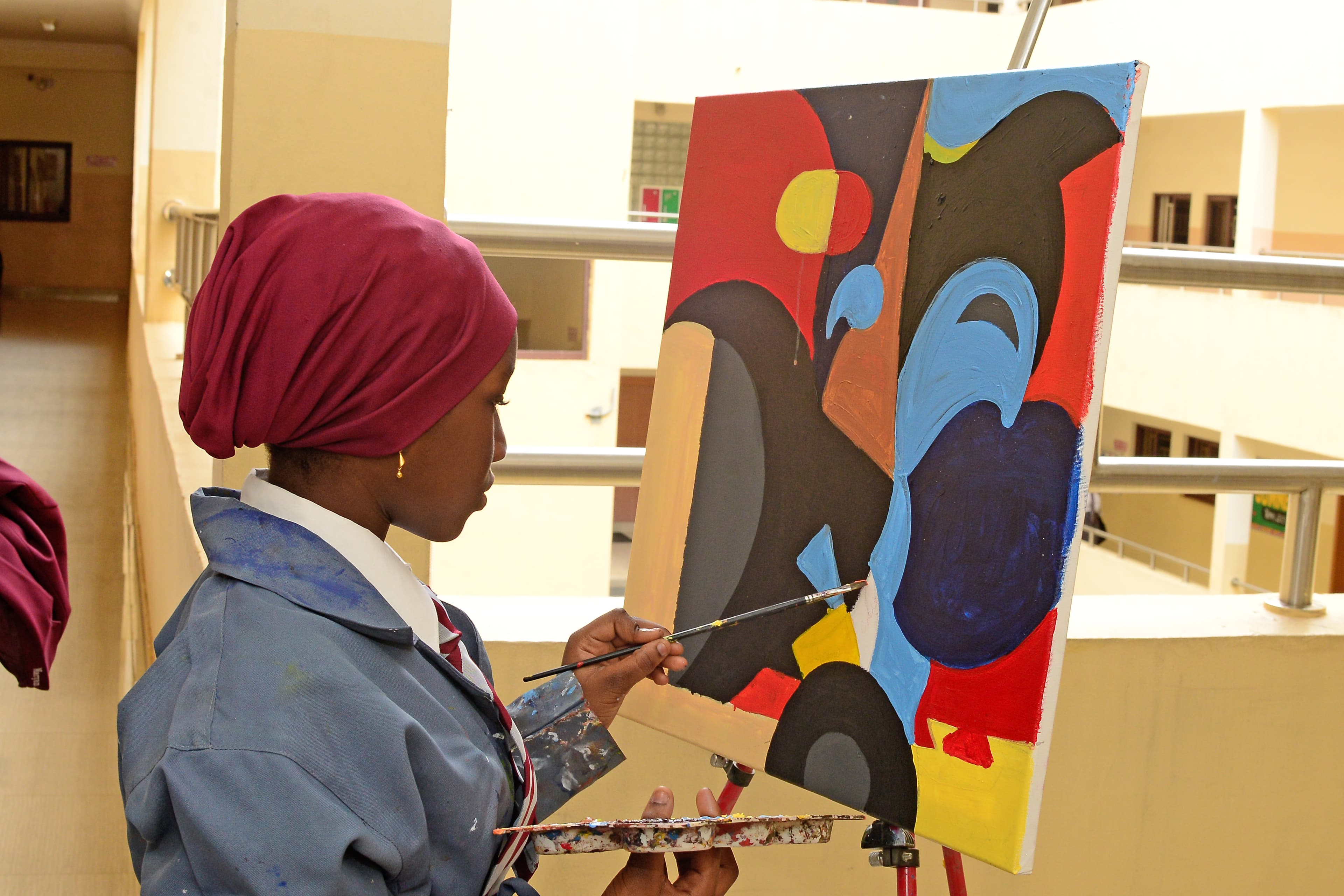 Students creating art in the studio