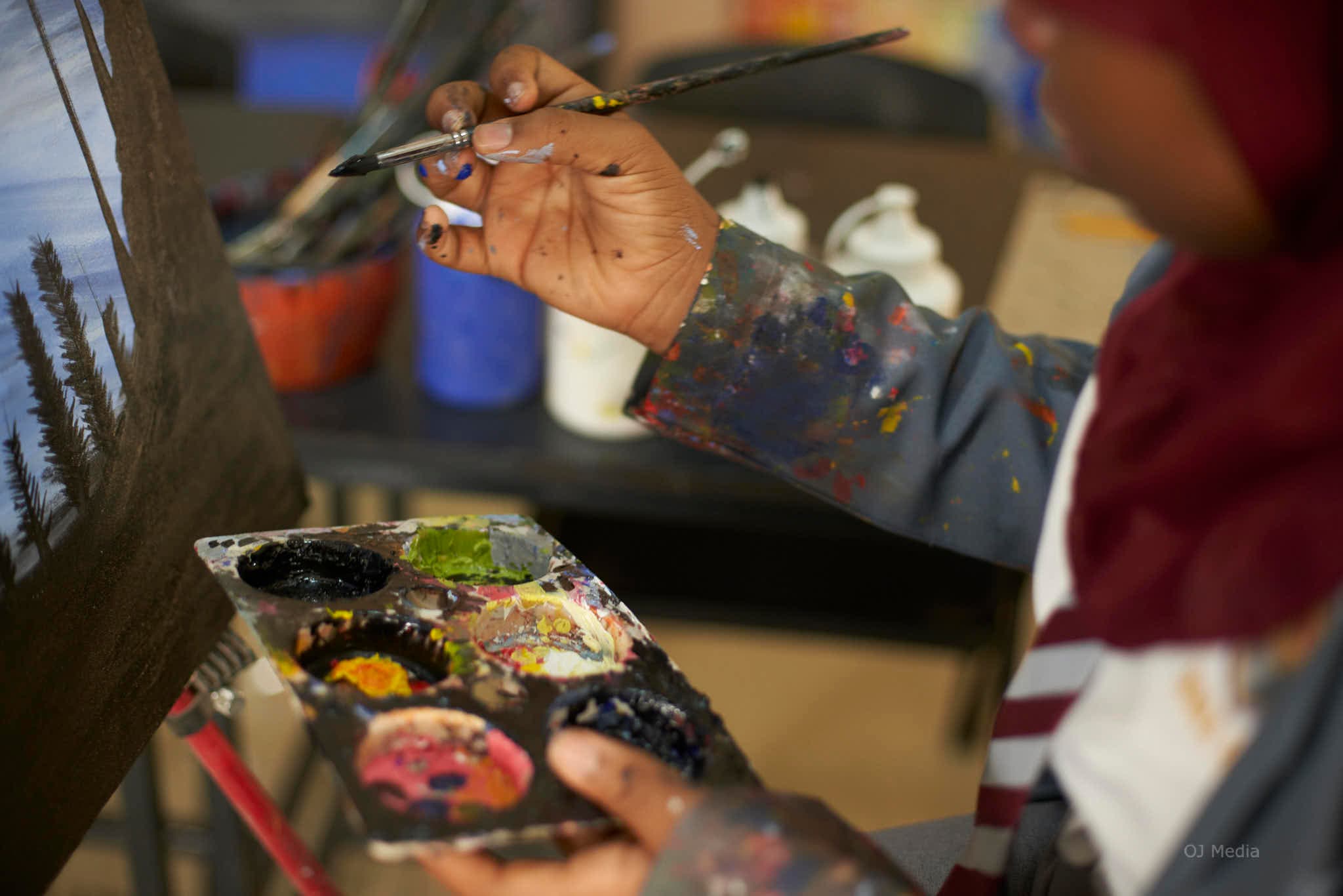 Students creating art in the studio