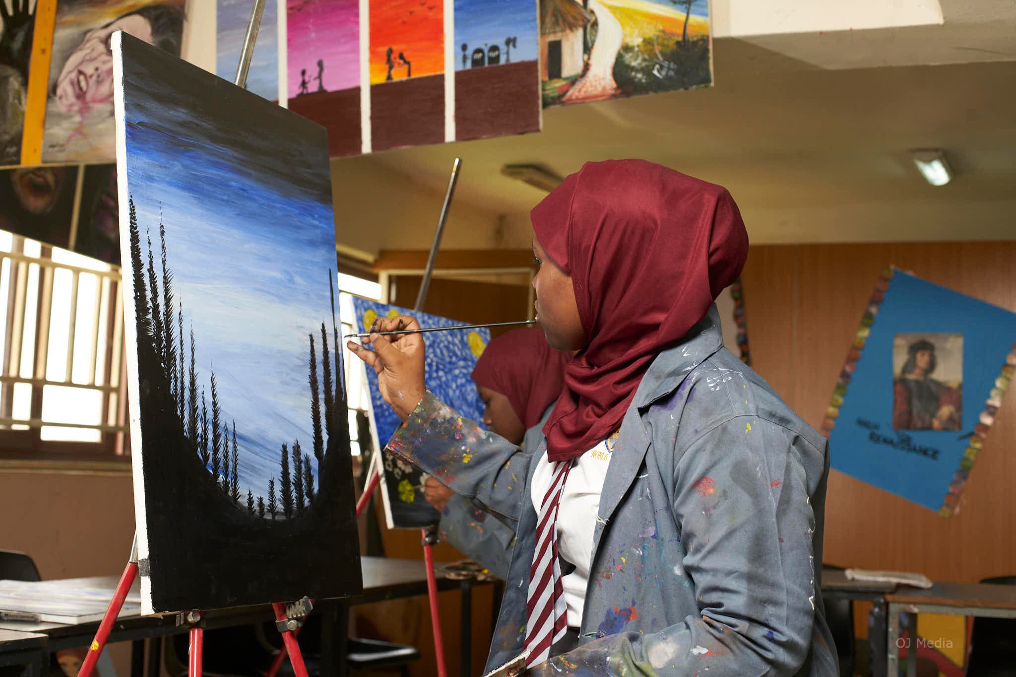 Students creating art in the studio