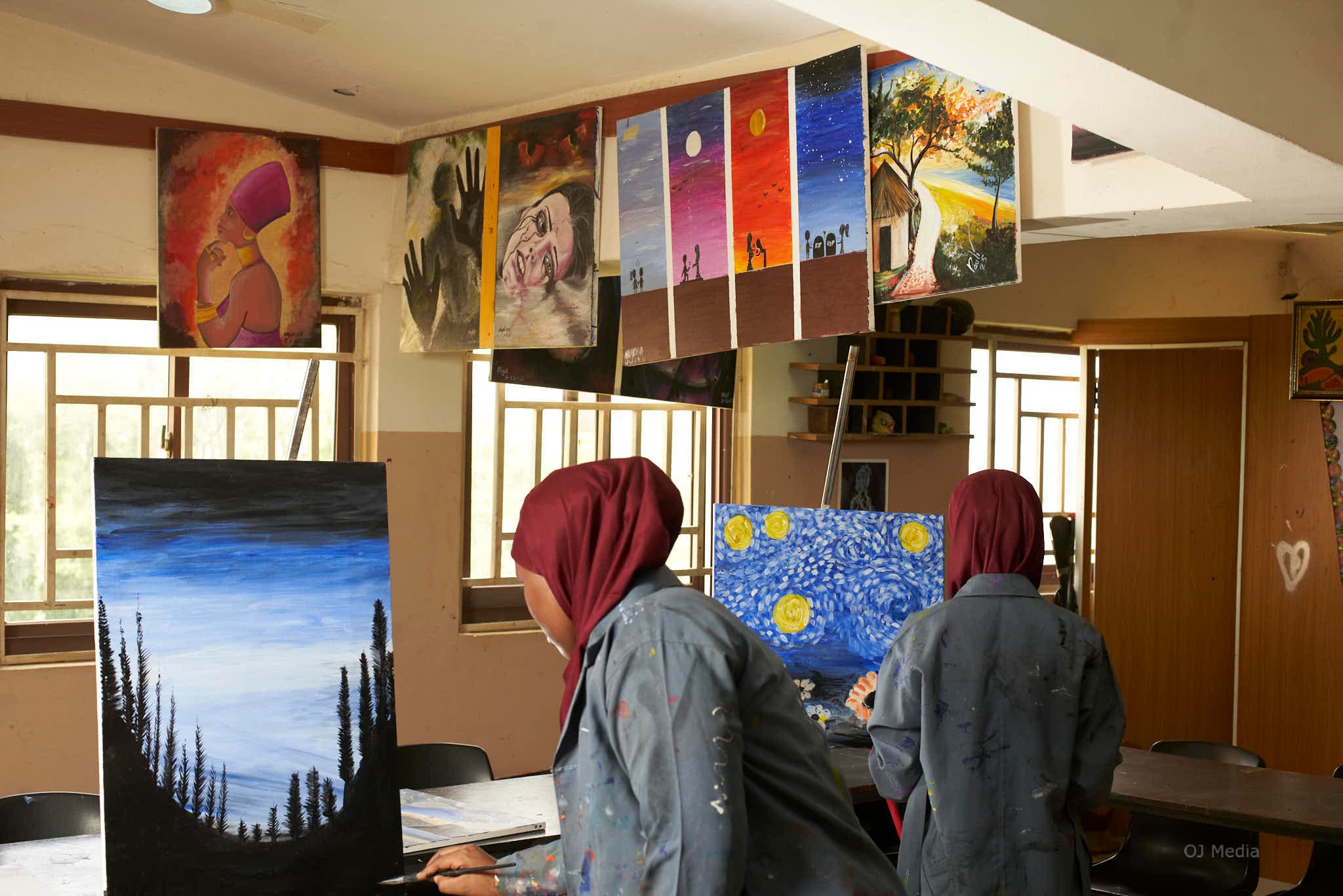 Students creating art in the studio